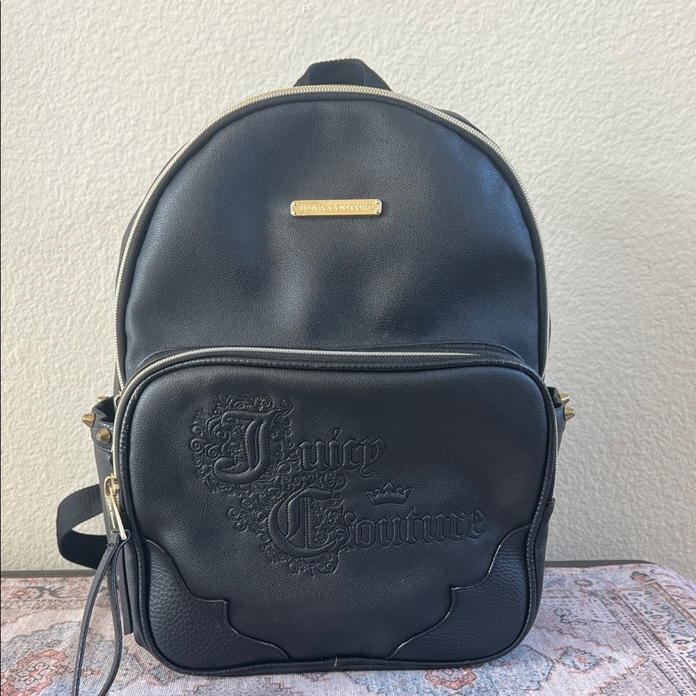 GUC Juicy Couture black embedded logo large backpack. Two side pockets.